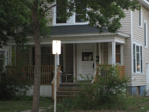 Cardboard Roscoe cutout being proudly displayed by the old house's new tenants.