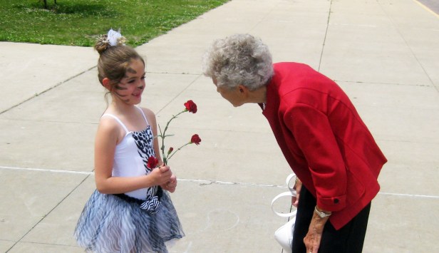 Peyton is congratulated by Grandma Bell after her ballet recital.