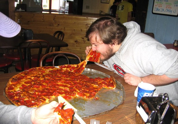 NORTH DAKOTA: Jason works on the giant pizza from D&B's in Rolla
