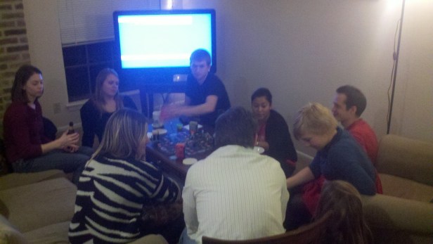 Friends gathering at our board game party Saturday night