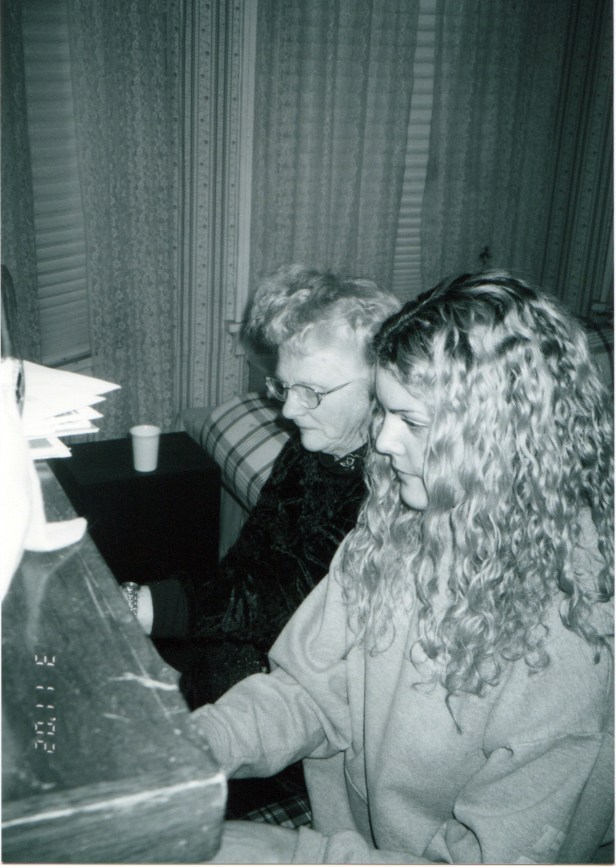 Jordan and Granny playing piano.
