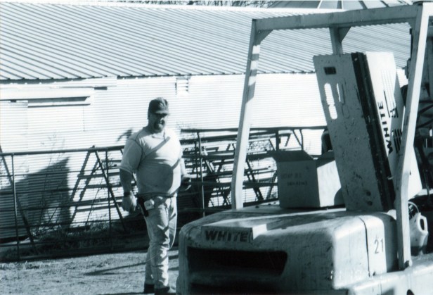 Dad out working on the farm.