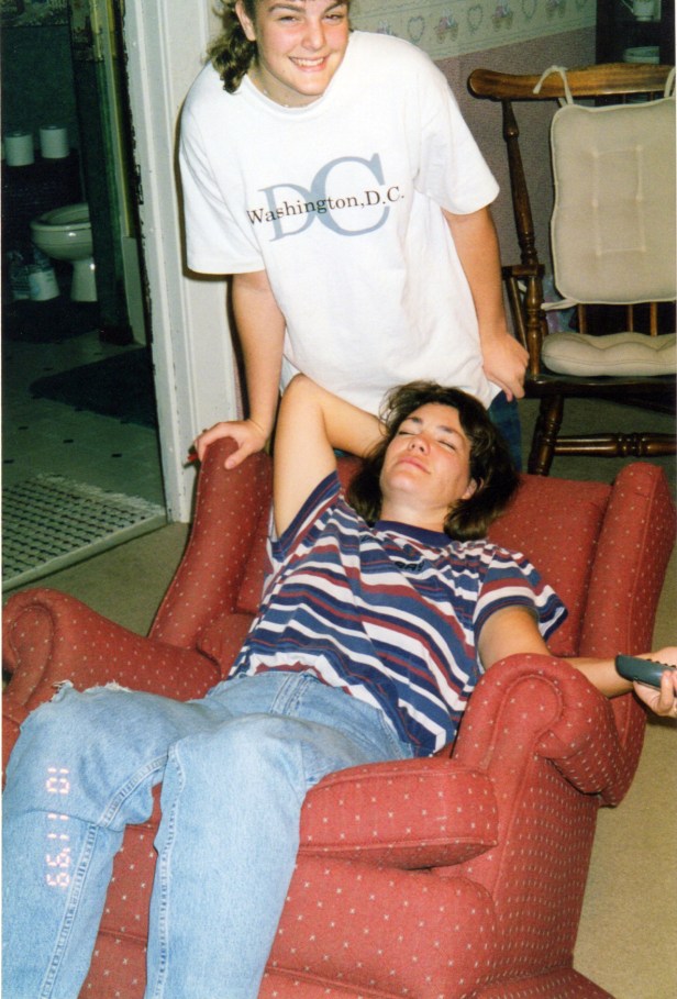 Jordan tipping Mom way back in a chair.