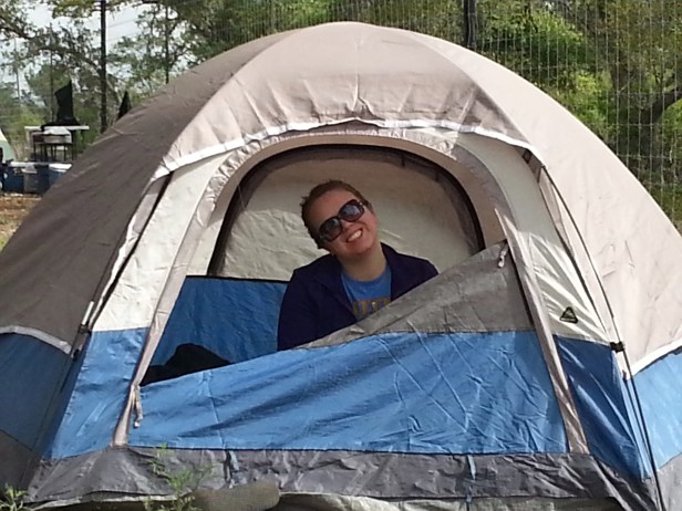 Lauren in our little 2-person pup-tent that was dwarfed by all the other tents on the campground. It's stood up well over time but we may need to invest in something new soon.