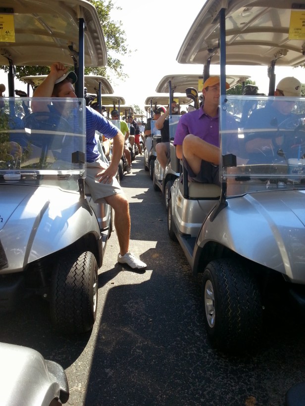 The teams lined up in their carts for the start of the tournament.