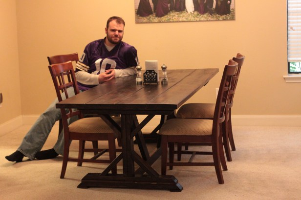 Me at my finished farmhouse table. A+ for effort! We'll see how she holds up in the long run.