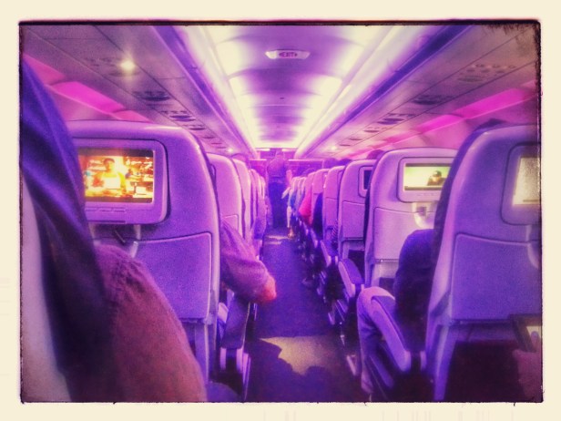 We flew Virgin America for the first time and it was super cool! I had free access to on-demand movies and TV shows (actual good ones) and could order food and drink at the touch of the screen. Plus the purplish tint was cool.