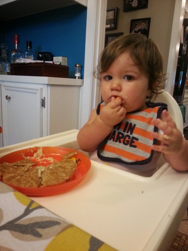 The Megos had us over for dinner on Sunday night. Here's our fairy-goddaughter Lexi enjoying her dinner.