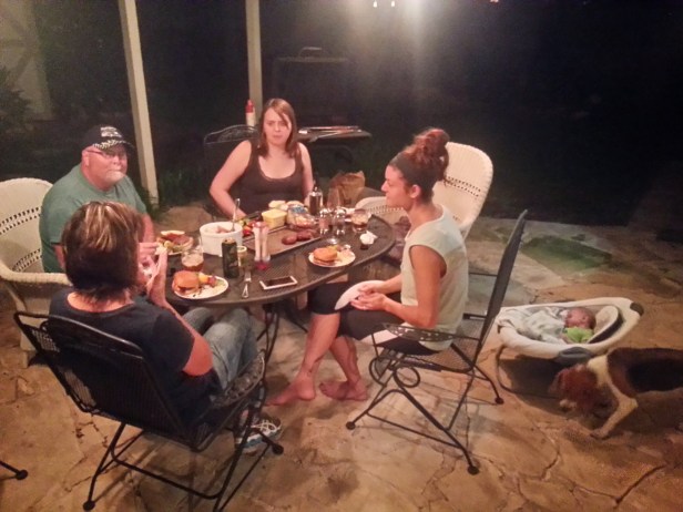 The family is welcomed back to Austin with a meal hot off the grill.