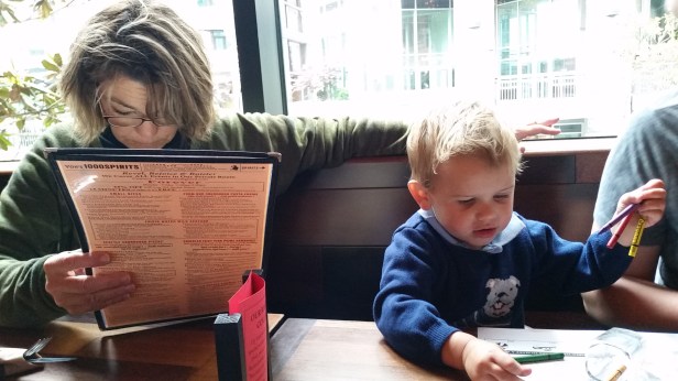 Grandma and Johnny browse the Von's menu.