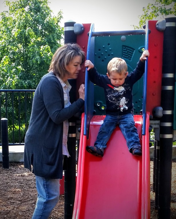 Grandma and Johnny on the Kerry Park slide.