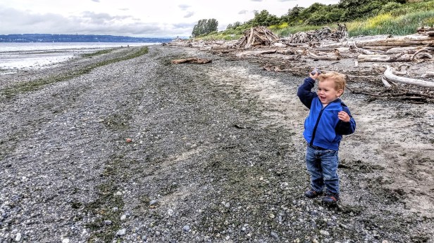 Love this shot of Johnny on the beach throwing rocks.